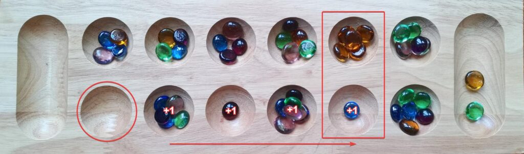 mancala board capturing stones