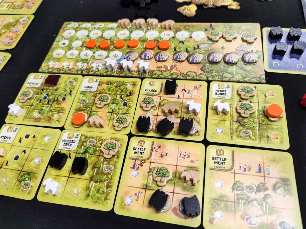 a close of of some tiles, each with various game components on them