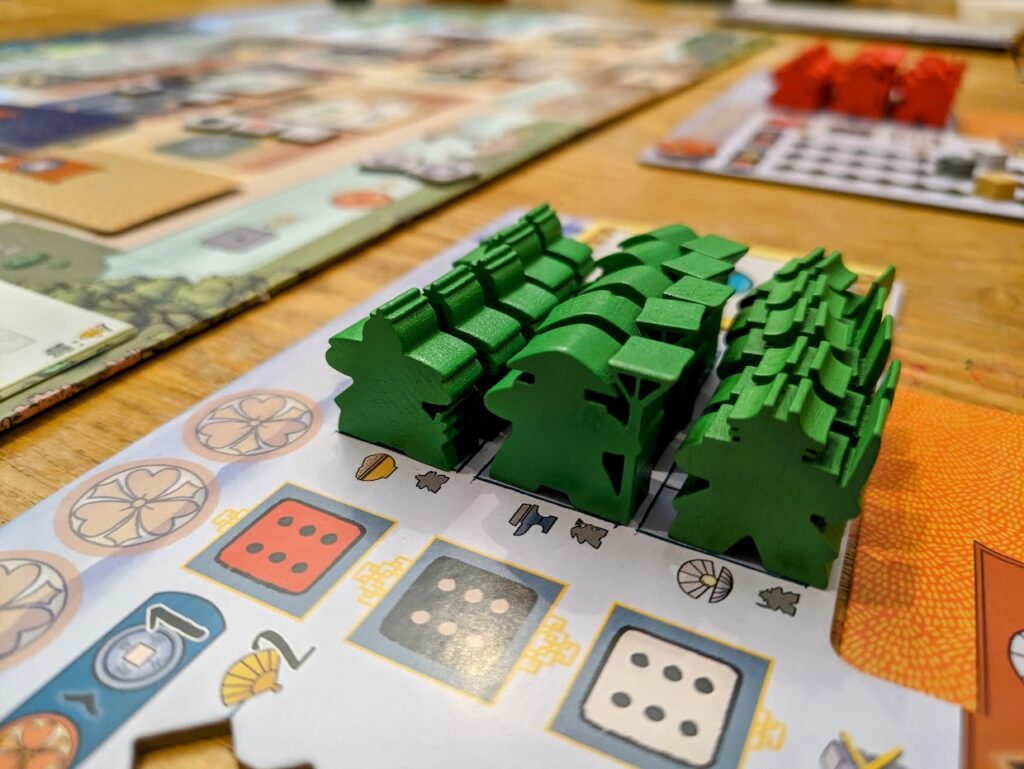 a close-up view of rows of green meeples