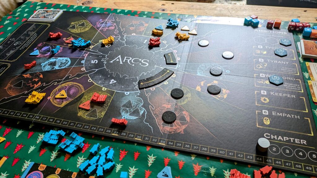 arcs board game being played on a table