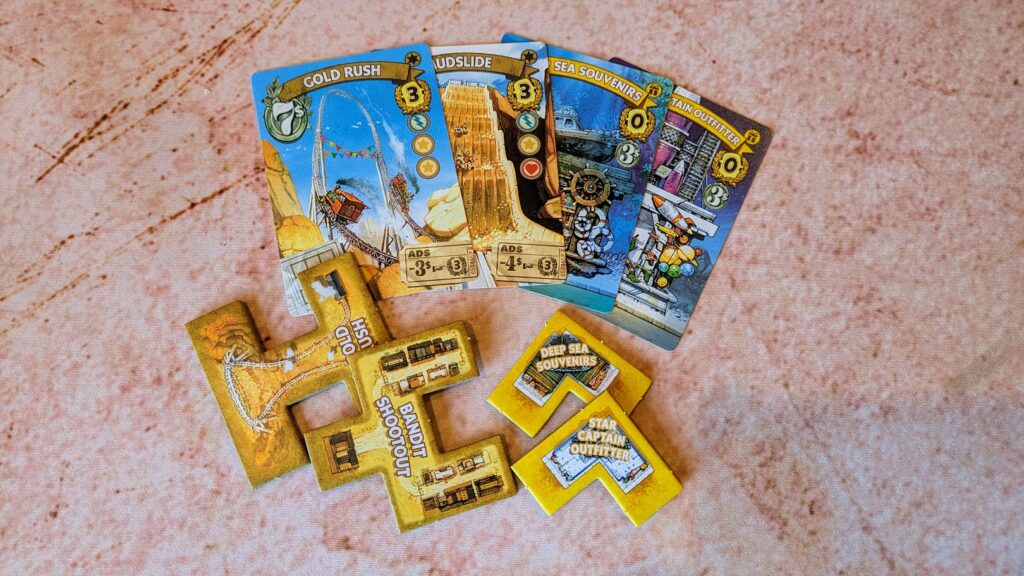 a photo of some cards and tiles from the game tenpenny parks