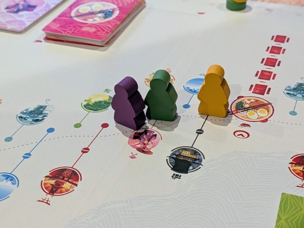 a close up of the travller meeples