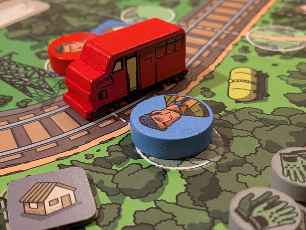 the train token moving down the rails