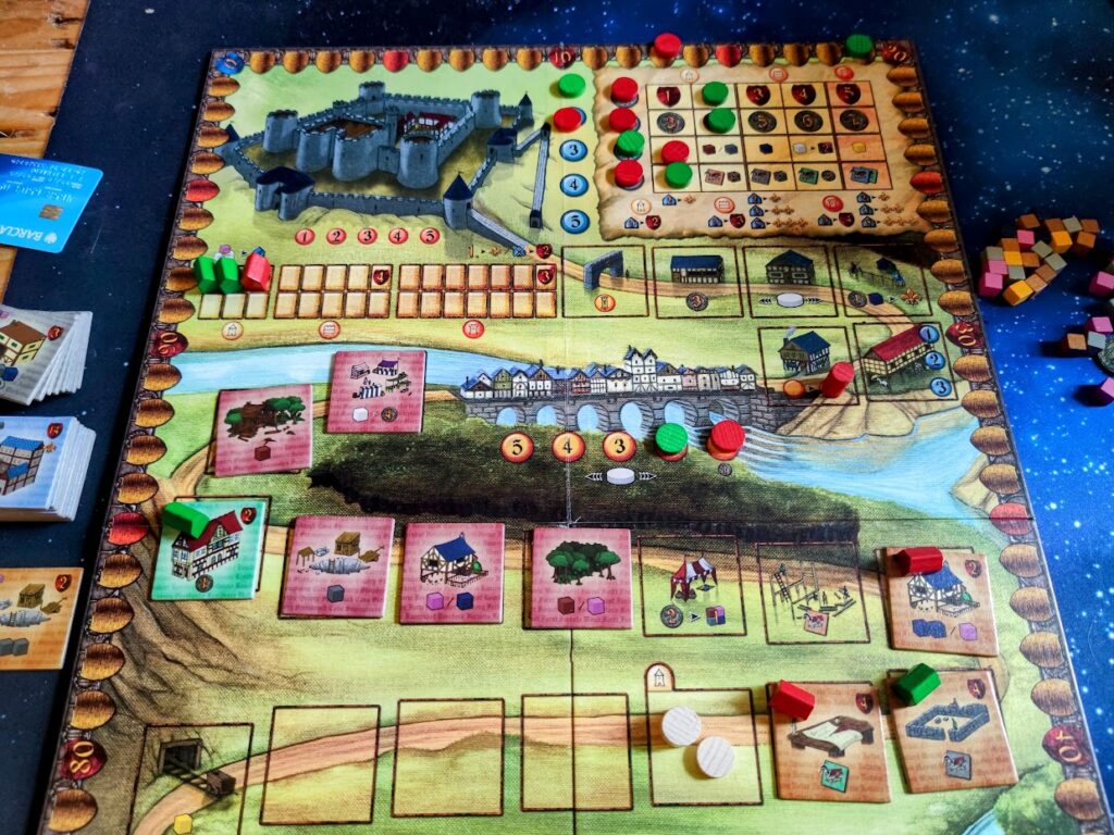 caylus board game being played on a table