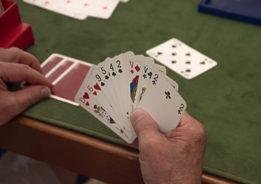 playing cards in hand